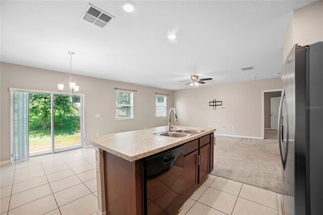 kitchen featuring black dishwasher, sink, ceiling fan with notable chandelier, light carpet, and stainless steel fridge