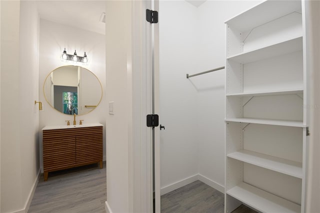 interior space featuring sink and light hardwood / wood-style flooring