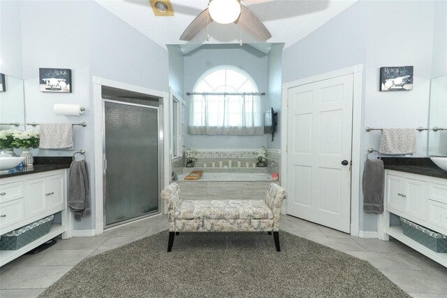 sitting room with sink, ceiling fan, and light tile patterned floors