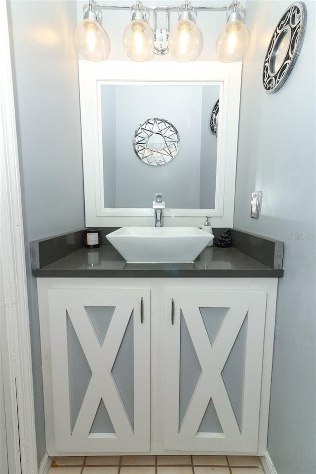 bathroom featuring sink and tile patterned flooring