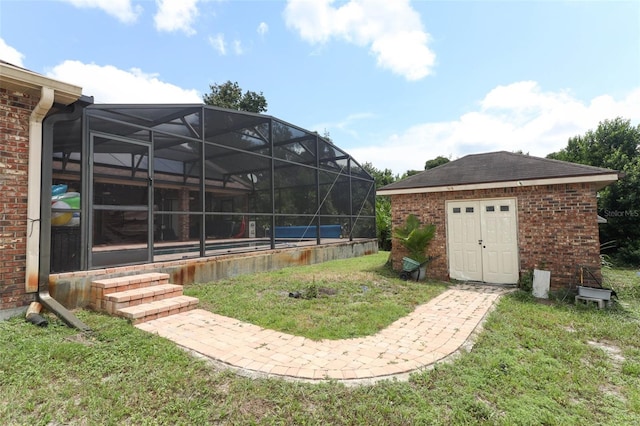 view of yard with glass enclosure