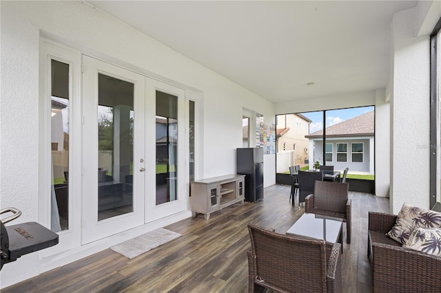 sunroom featuring french doors