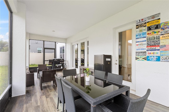 sunroom featuring french doors