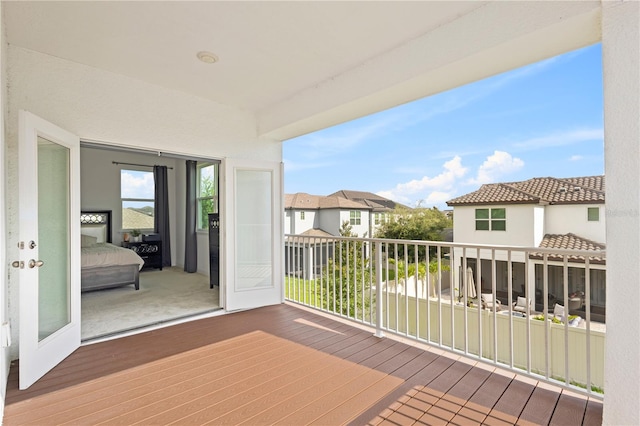 wooden deck featuring a residential view