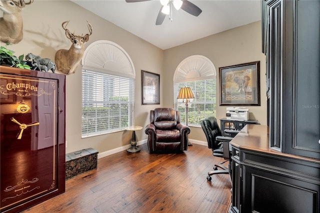 office space with ceiling fan, dark wood-type flooring, and vaulted ceiling