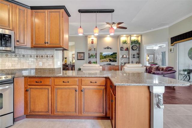 kitchen with light tile patterned flooring, range, decorative backsplash, ceiling fan, and kitchen peninsula