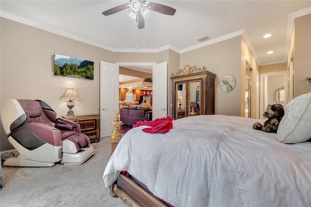 carpeted bedroom featuring ceiling fan and crown molding