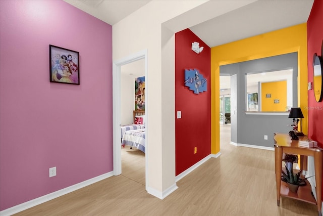 corridor featuring light hardwood / wood-style flooring