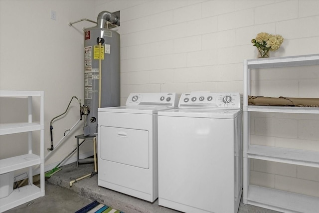 laundry area featuring washer and dryer and gas water heater