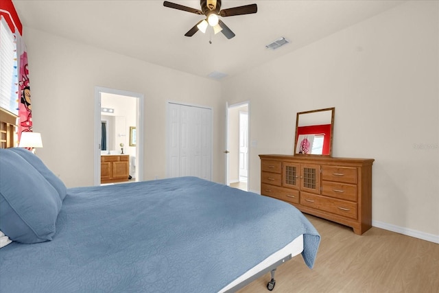 bedroom with ensuite bathroom, a closet, ceiling fan, and light wood-type flooring