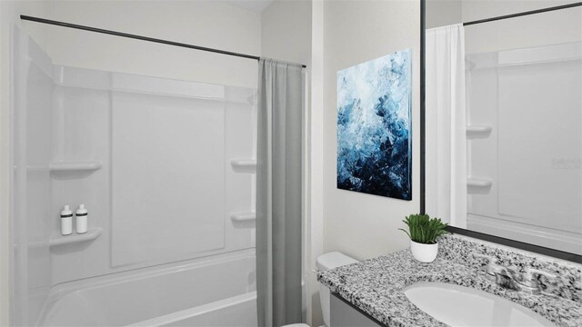 bathroom featuring shower / tub combo, vanity, and toilet