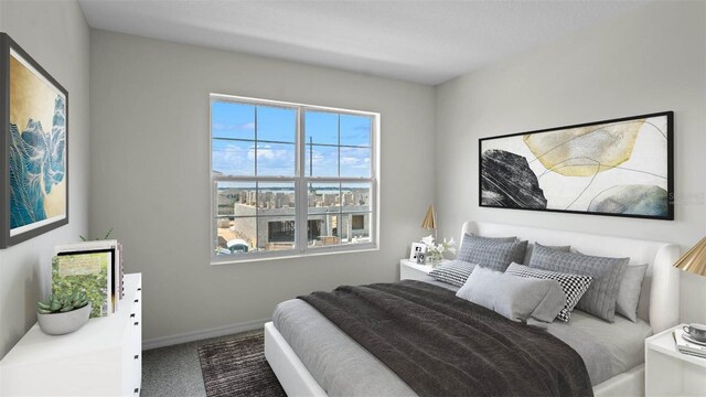 bedroom featuring carpet and baseboards