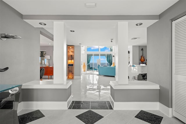 bathroom with tile patterned floors