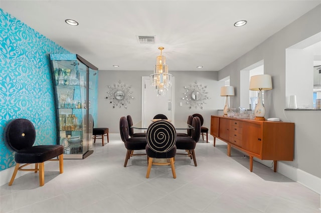 dining room with baseboards, recessed lighting, visible vents, and a notable chandelier