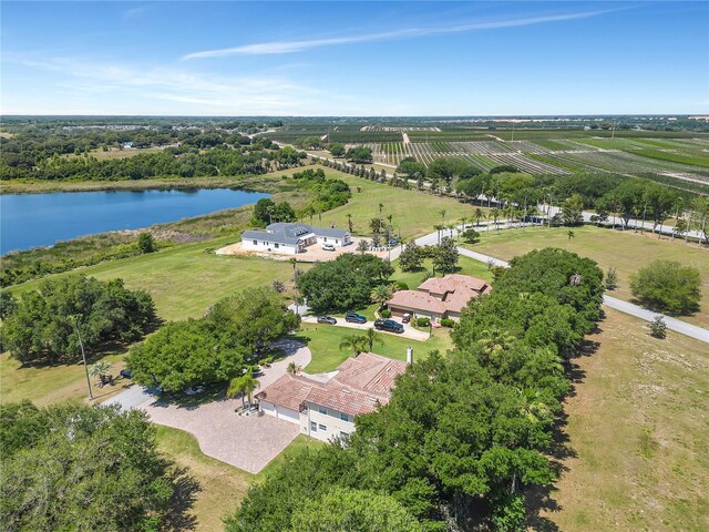 drone / aerial view featuring a rural view and a water view