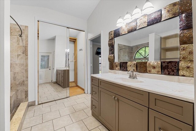 bathroom featuring tile patterned floors and vanity