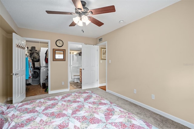 unfurnished bedroom featuring ceiling fan, a closet, connected bathroom, and light carpet