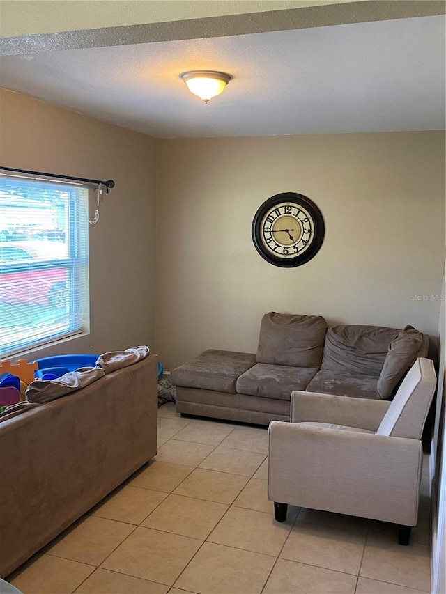 living room featuring light tile patterned flooring