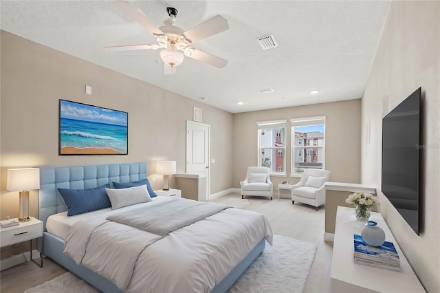 bedroom featuring visible vents, ceiling fan, and baseboards