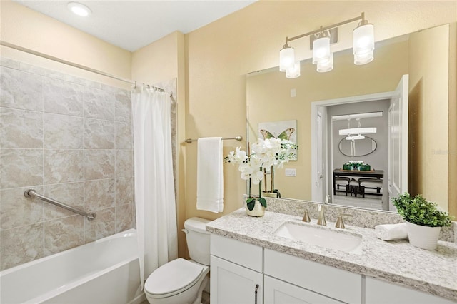 7573 Laureate Blvd Unit 1301, Orlando, FL 32827 - bathroom featuring toilet, shower / tub combo, and vanity