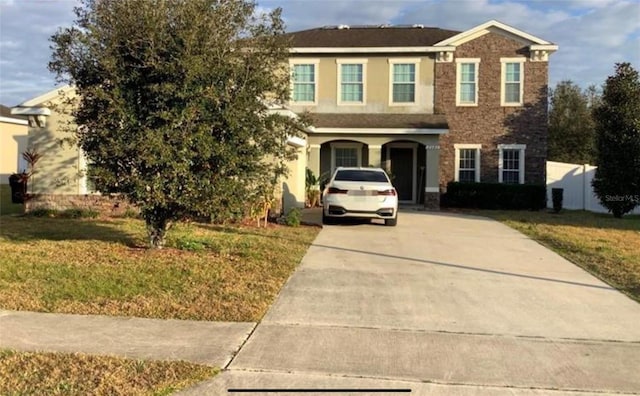 view of front of property with a front lawn