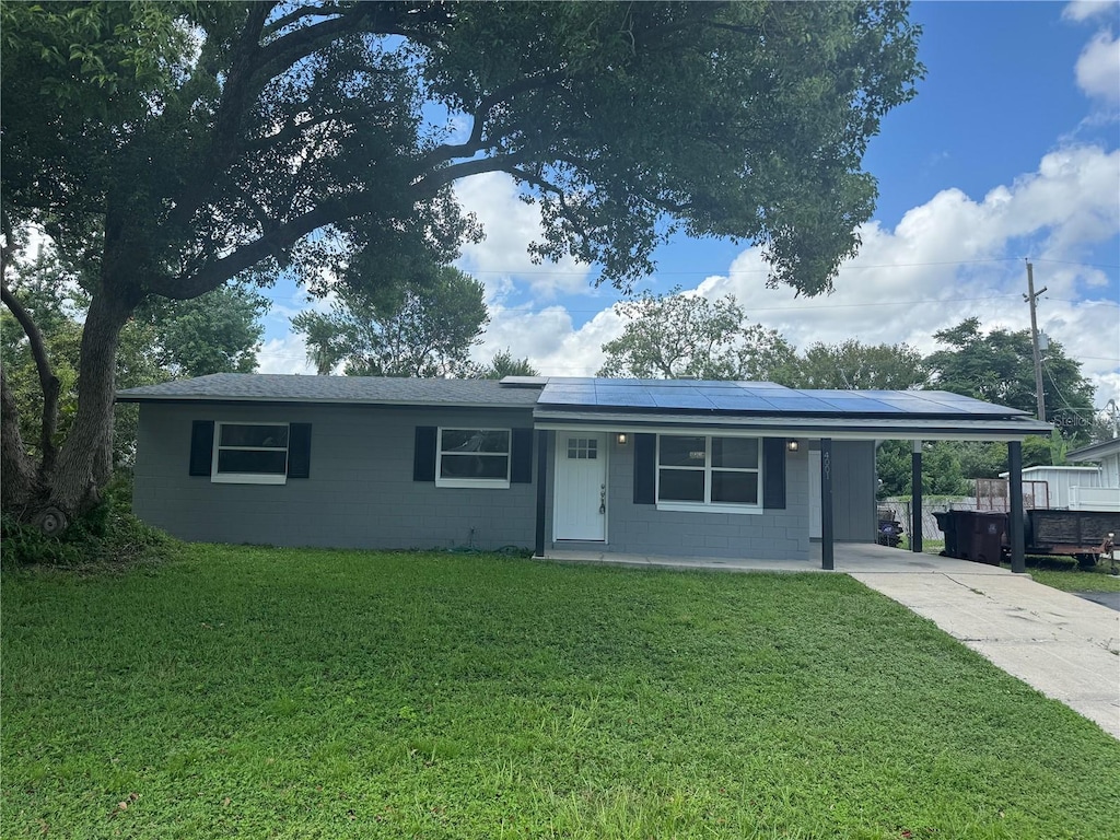 single story home featuring a front yard