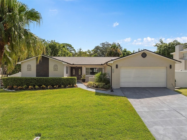 ranch-style home featuring a front yard and a garage