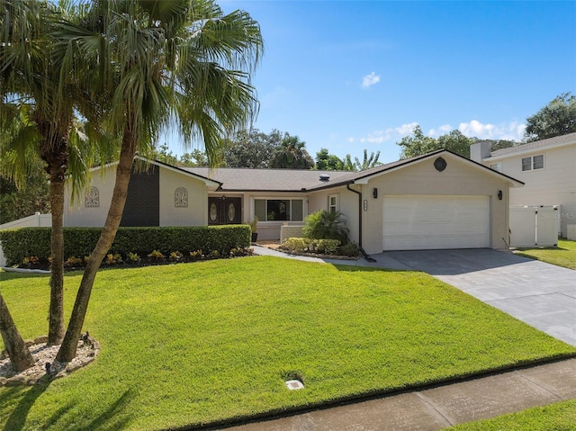 single story home with a garage and a front yard