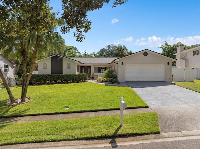 single story home featuring a garage and a front lawn