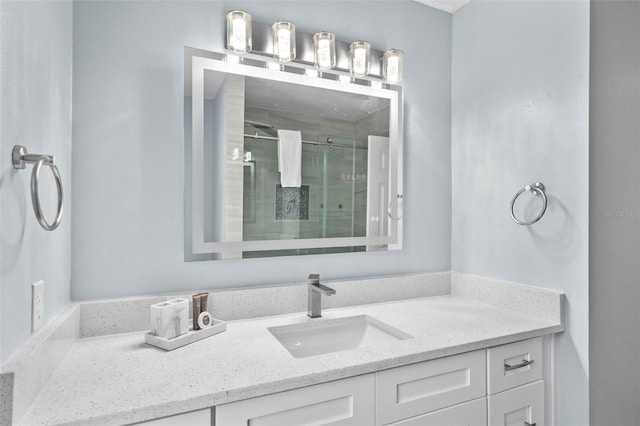 bathroom with vanity and an enclosed shower