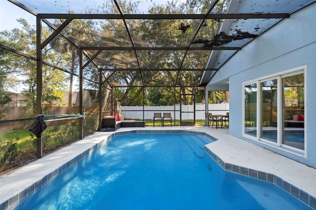 view of pool featuring a lanai