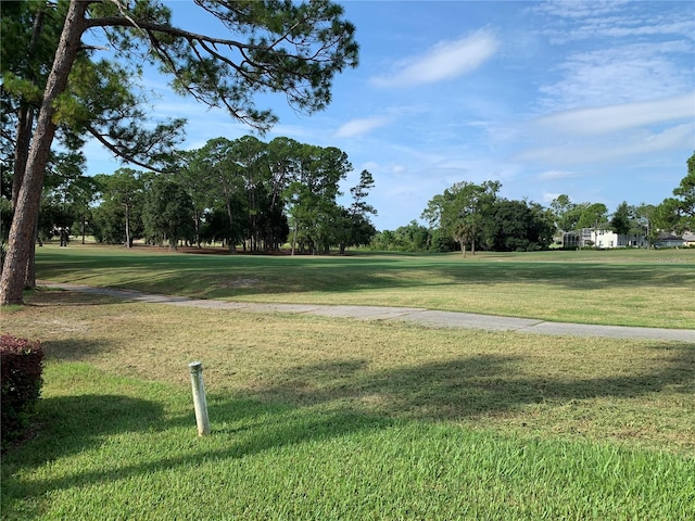 view of home's community featuring a yard