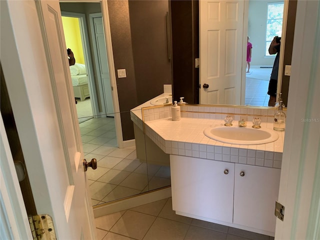 bathroom with vanity and tile patterned floors