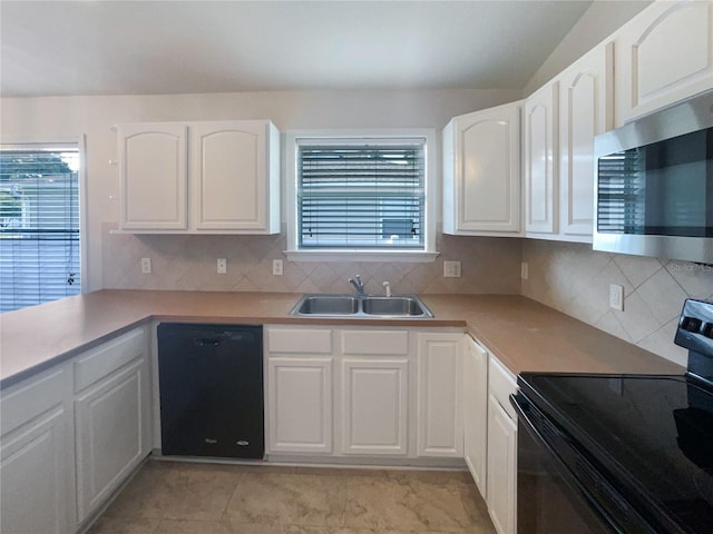 kitchen with backsplash, sink, black appliances, white cabinets, and light tile patterned flooring