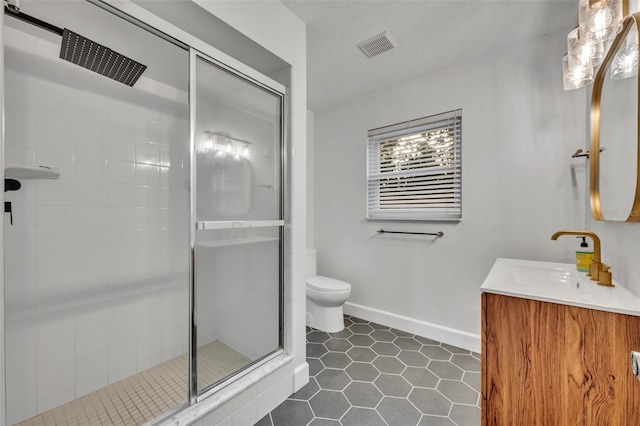 full bath with a stall shower, visible vents, baseboards, toilet, and tile patterned flooring