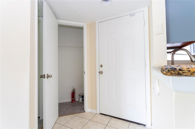1932 Lake Atriums Cir Unit 86, Orlando, FL 32839 - interior space featuring light tile patterned floors and baseboards
