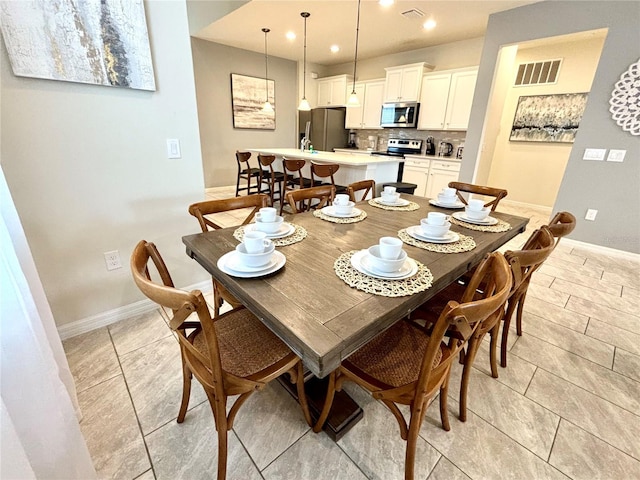 view of tiled dining space