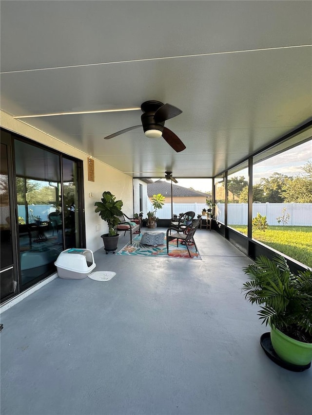 exterior space with a ceiling fan