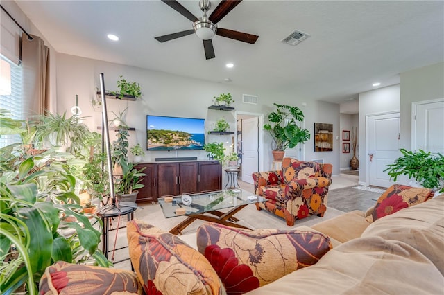 living room featuring ceiling fan