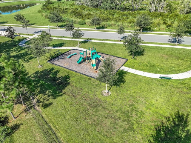 birds eye view of property with a water view