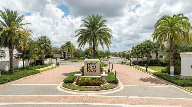 view of community featuring a gate and fence