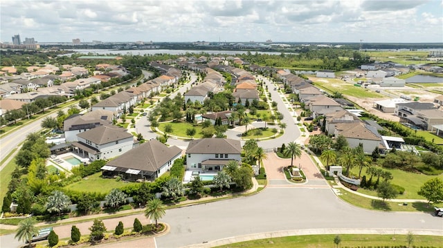 aerial view featuring a residential view and a water view