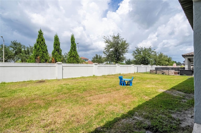 view of yard with fence