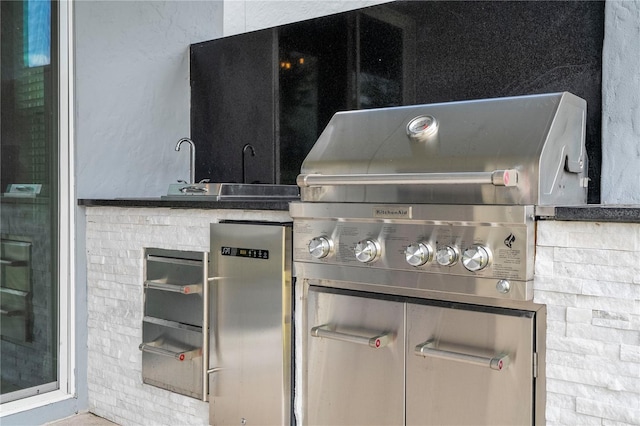 view of patio / terrace with grilling area and mail area