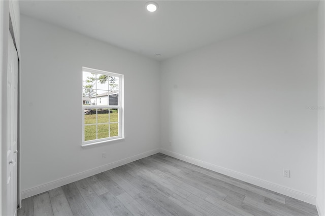 empty room featuring light hardwood / wood-style floors