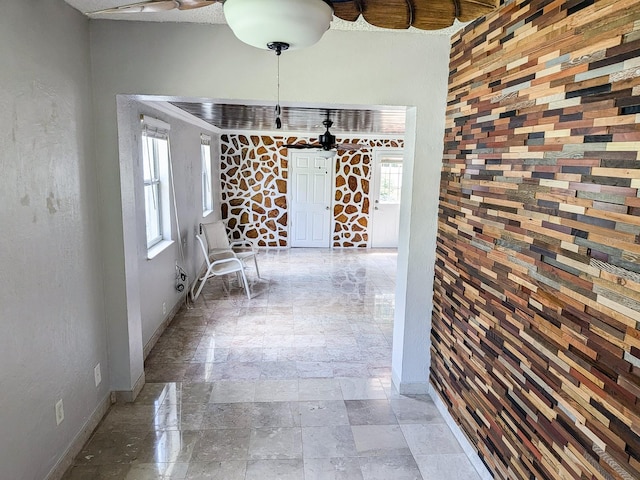 corridor featuring tile patterned floors