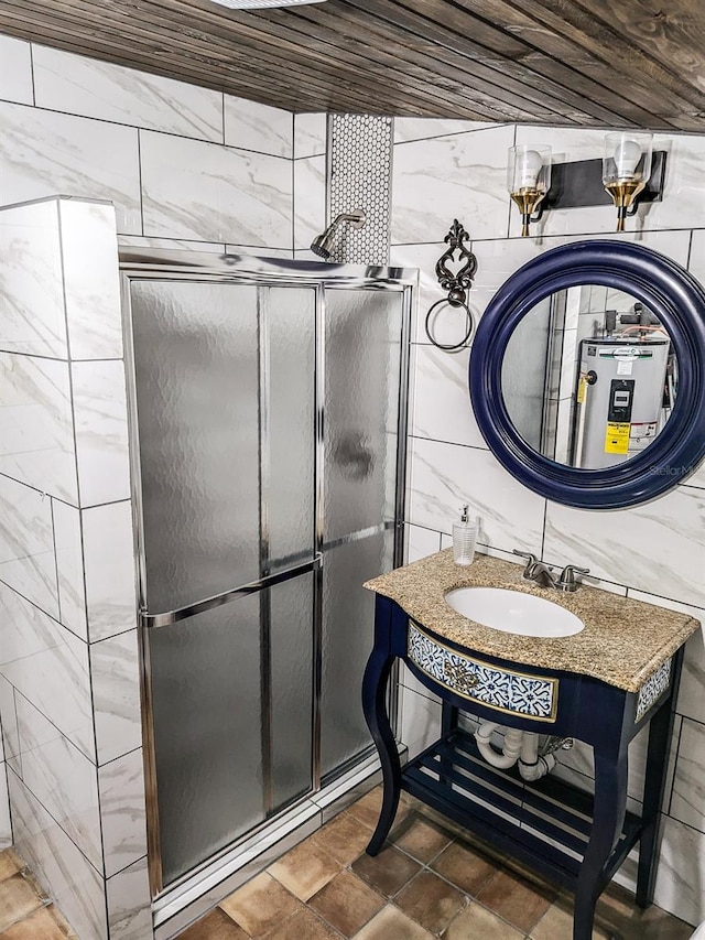 bathroom with tile walls, sink, tile patterned floors, and wood ceiling