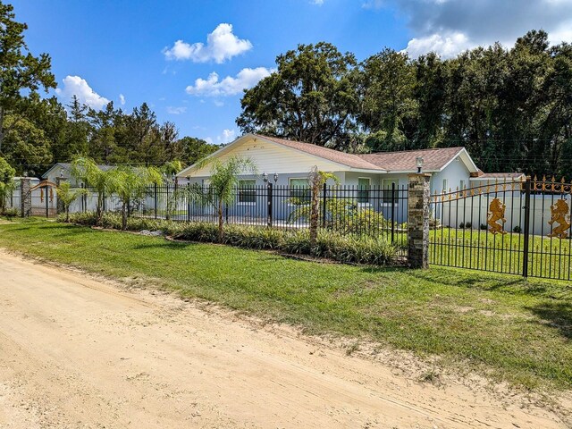 exterior space featuring a front lawn