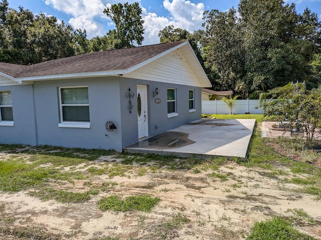 view of front of house with a patio