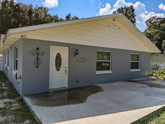 view of front of property featuring a patio area